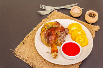 Crusty roasted duck leg. Traditional French food confit preparation