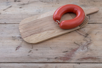 Swedish sausage -falukorv on a beautiful wooden table.