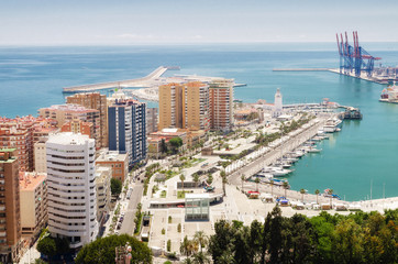 Cityscape of Malaga with mediterranean sea port harbor. Andalusia, Spain .