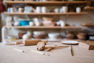 Plottery equipment on wooden table in workshop