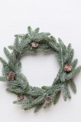 Fototapeta na wymiar Christmas wreath. Christmas decorations on white background. Flat lay, top view