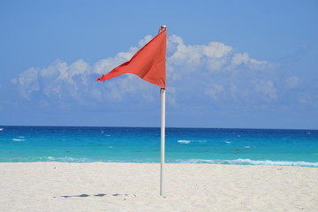 red flag on the beach