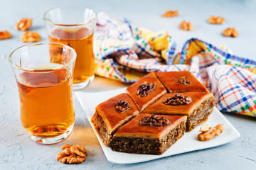walnut baklava with glasses of tea