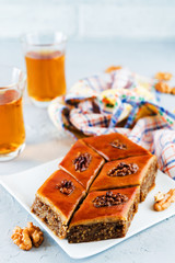 walnut baklava with glasses of tea