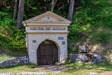 View on Entrance to Mining Tunnel Kaiser Franz Josef Hilfsstollen under Predil Pass in Log pod Mangartom, Bovec, Slovenia, Europe.