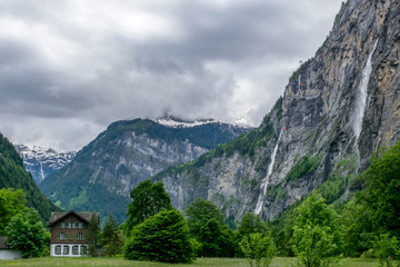 Fototapeta na wymiar Cloudy Lauterbrunnen valley in Switzerland's Alps