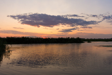 Obraz na płótnie Canvas Sunset reflecting at Havel, Westhavelland, Havelaue, Brandenburg, Germany
