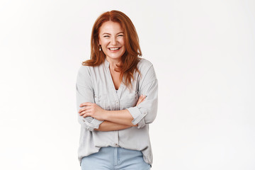 Bright happy successful redhead middle-aged woman loved caring mother laughing funny grandchild...