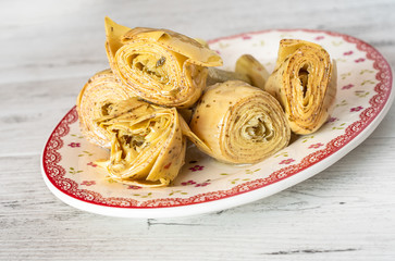 Pickled artichoke alla romana in the plate, traditional italian appetizer.