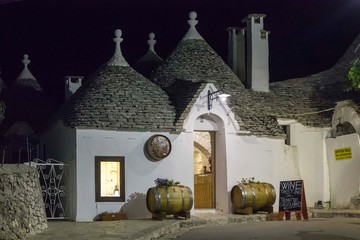 ALBEROBELLO, ITALY - AUGUST 27 2017: Night view of a traditional restaurant in the town of...
