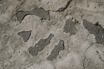 Cracked concrete texture closeup background old font