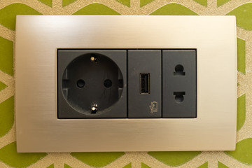 Beautiful sockets and black switches in various combinations with an aluminum frame. USB port.