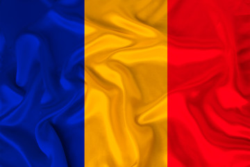 photo of the national flag of Romania on a luxurious texture of satin, silk with waves, folds and highlights, close-up, copy space, concept of travel, economy and state policy, illustration