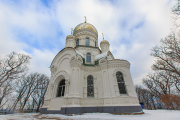 Fototapeta na wymiar Beautiful Orthodox church in the winter at the top of the hill