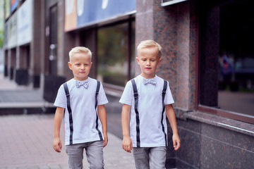 two boys go near the store