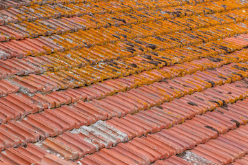 Background of old terracotta roof tiles in Tuscany, Italy
