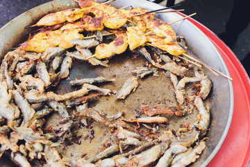 Paella seafood is cooked in a large capacity. Large.