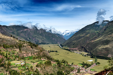 High level view of part of the Valle Sagrada (Sacred Valley) with Pisac, Peru at the bed of the valley