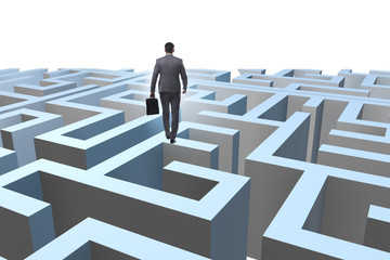 Businessman trying to escape from maze