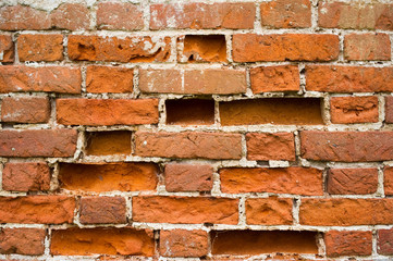 Texture of a very old crumbling brick wall. Part of an antique building. close up © Вячеслав Думчев