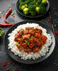 Tso's chicken with rice, green onion and broccoli