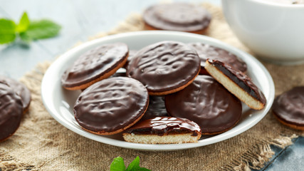 Jaffa cakes sweet cookies with orange, chocolate and coffee