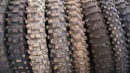 Used off road motocross tires background .