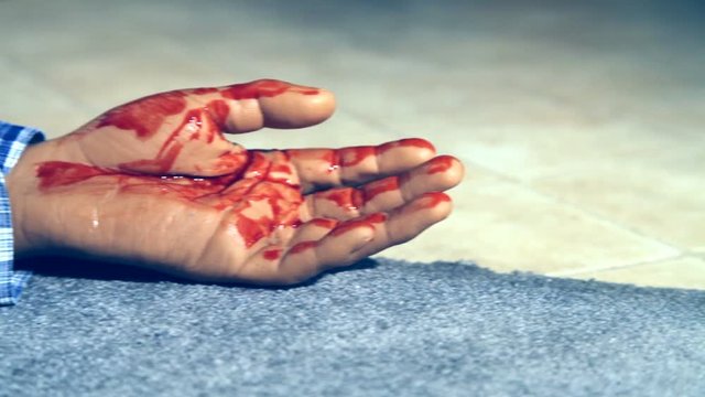 Bloody hand on the floor.mov