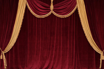 Scarlet velvet curtains with lambrequin and gold fringe in vintage style