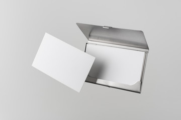 top view of business card with case on white