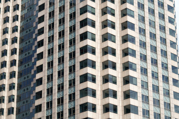 Fototapeta na wymiar close up on facade view of glass windows in office building