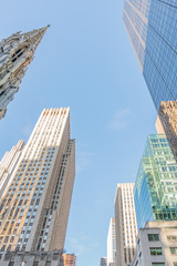New York City, NY, USA - December, 2018 - Skyline view of the top of the buildings at Fifth Avenue, near the Cathedral of St. Patrick.
