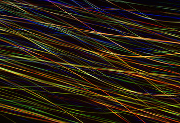 abstraction . The spatial speed of movement of neon rays or colored lines against the night sky