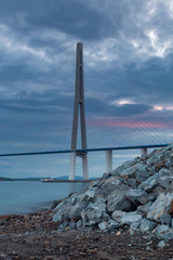 Evening view of long cable-stayed bridge in Vladivostok, Russia