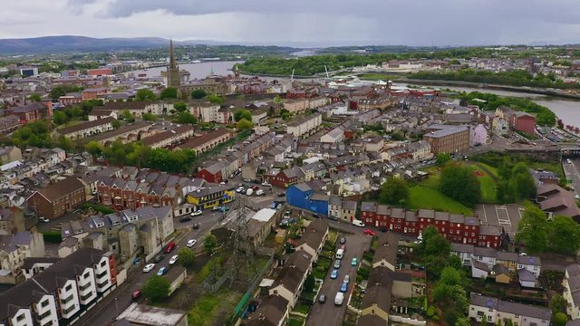 Aerial of cars driving on the streets of Derry city in Northern Ireland