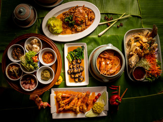 Food and ingredients on the banana leaves.