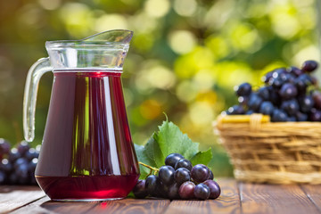 grape juice in glass jug