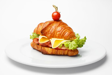 croissant with a cheese and a bacon