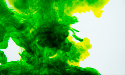 Abstract motion color water drop in water, Ink swirling in water background