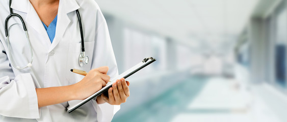 Woman doctor working at the hospital office. Medical healthcare and doctor staff service.