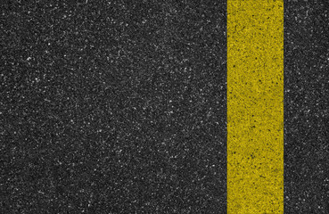 Fototapeta premium yellow line on the road texture