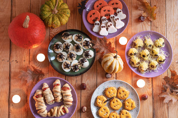Elevated view of table with Halloween decorated food