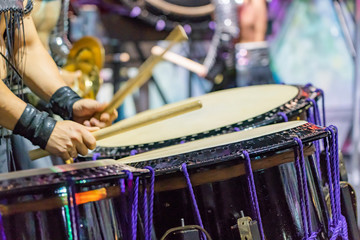 Closeup View Of Man's Hands, Drums and Drumsticks.