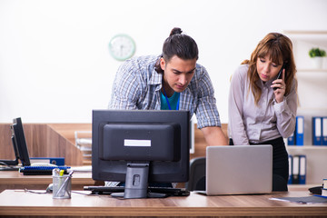 Young male it specialist in the office