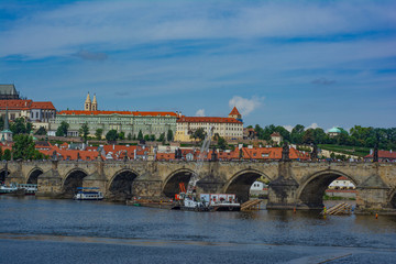 Obraz premium Repair of the supports of Charles Bridge with a floating crane and special equipment