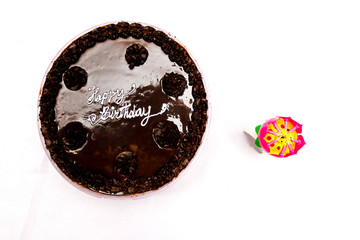 Happy birthday Chocolate cake with candle aside