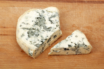 blue cheese on wooden board