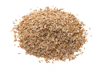Pile of dill seeds on white background