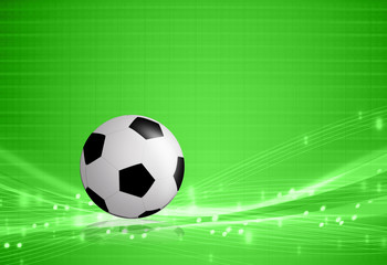 Soccer ball on green abstract background