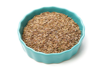 Pile of dill seeds on white background